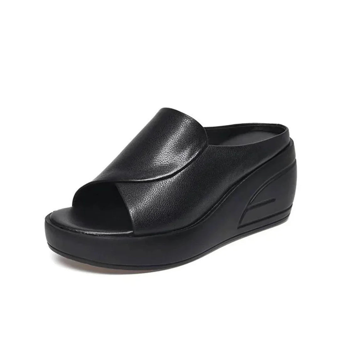 Cushioned wedge slip-on sandal in black