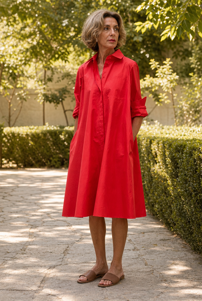 Flowing dress with pockets worn in a sunlit garden