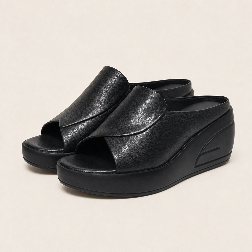 Cushioned wedge slip-on sandal, studio product shot
